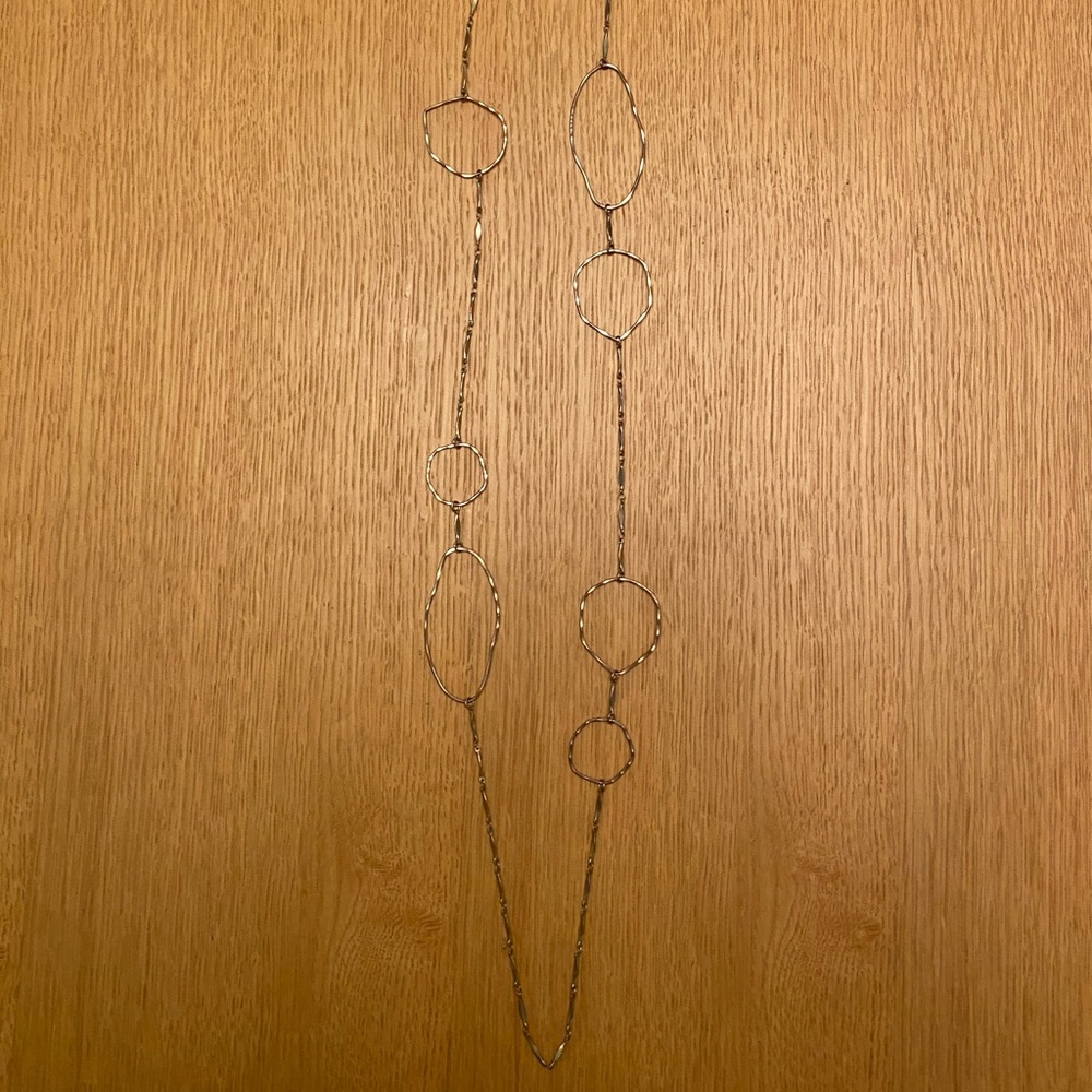 Long gold necklace